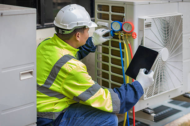 Professional Hvac Installation technician working in Pfafftown, NC